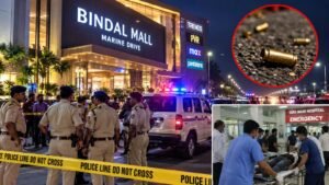 मरीन ड्राइव स्थित बिंदल मॉल के पास फायरिंग के बाद जांच करती पुलिस।